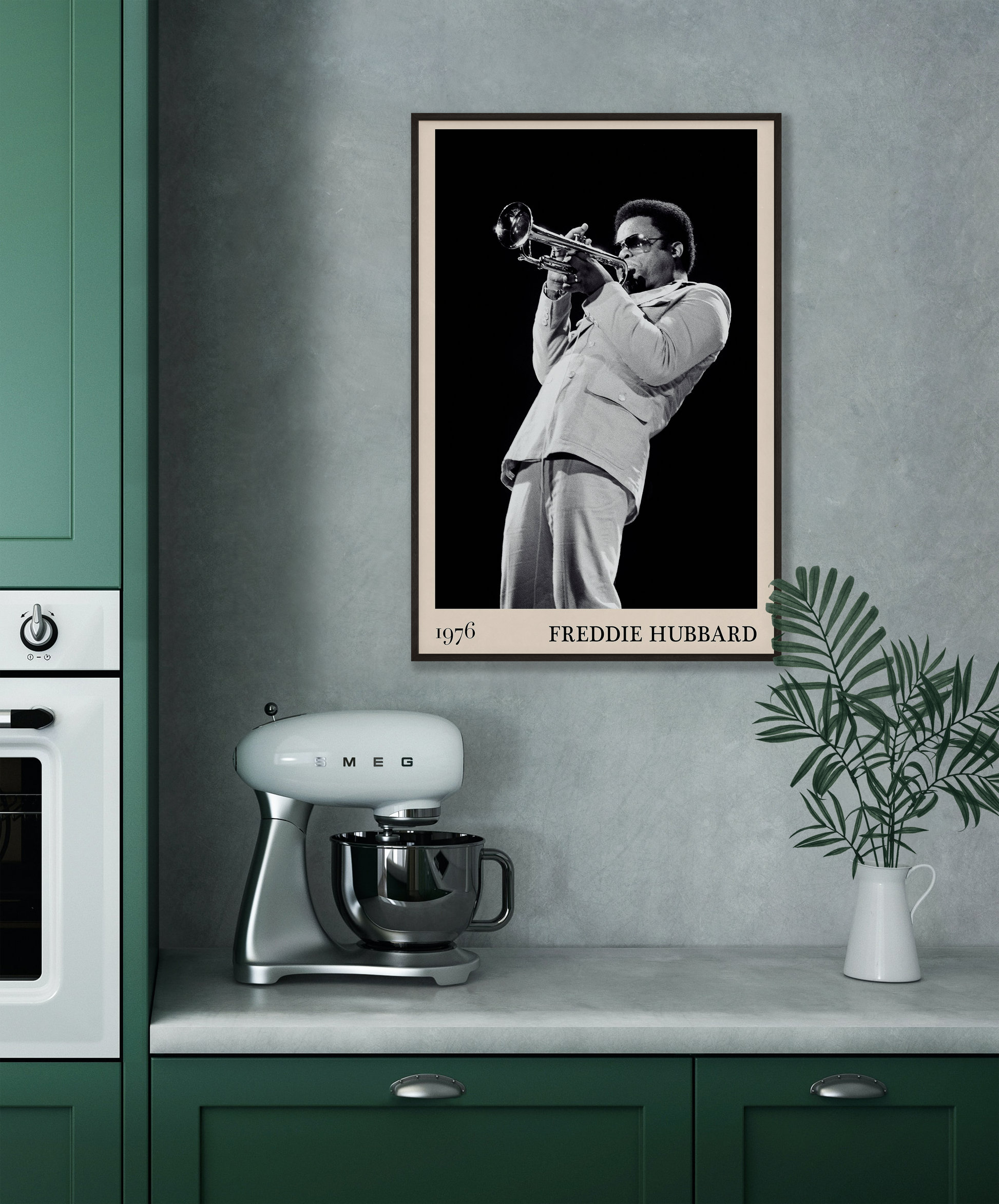 1976 photograph of Freddie Hubbard taken by Thomas Marcello. Picture crafted into a cool black framed jazz print, with an off-white border. Poster is hanging on a grey kitchen wall.