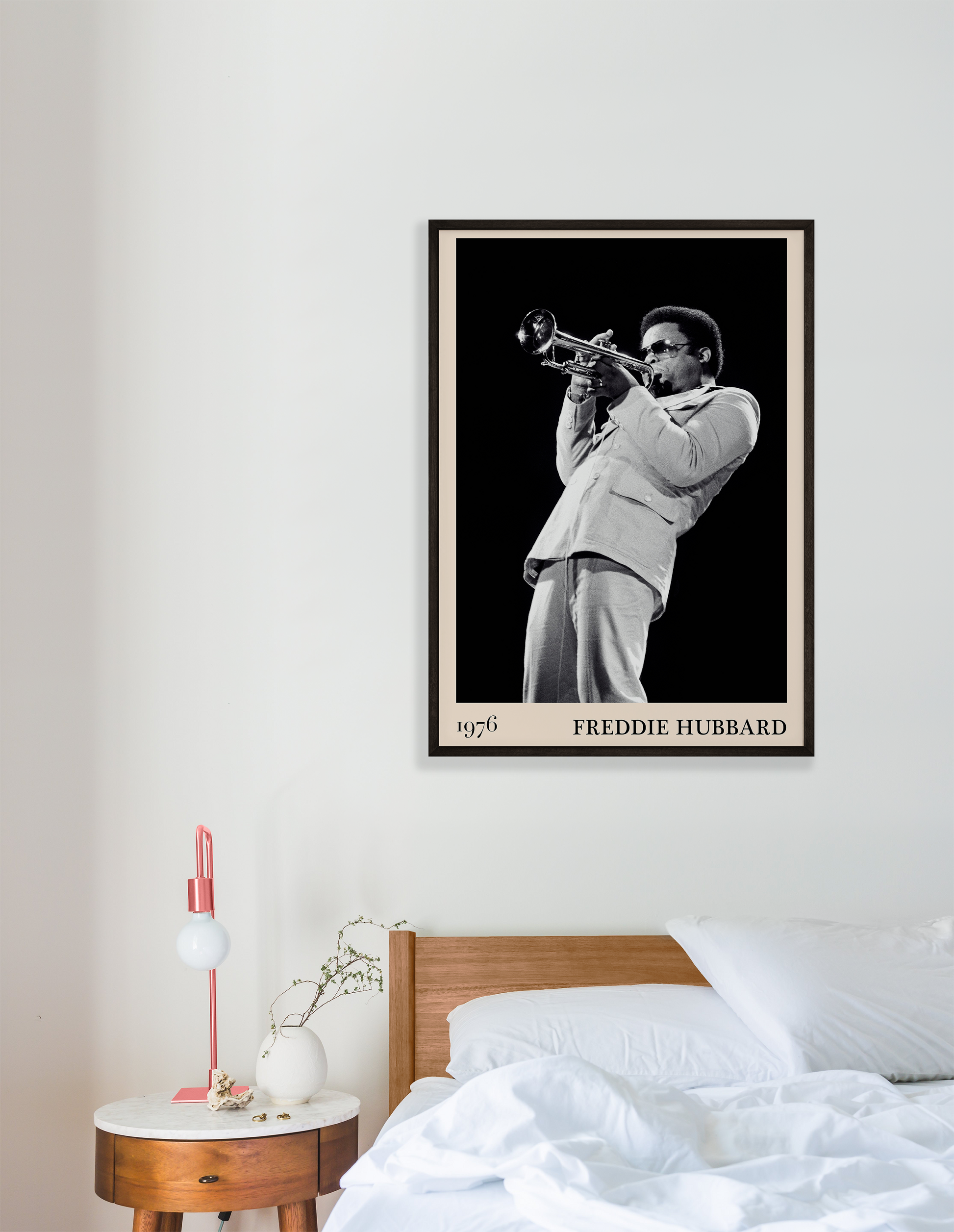 1976 photograph of Freddie Hubbard taken by Thomas Marcello. Picture crafted into a cool black framed jazz print, with an off-white border. Poster is hanging on a white bedroom wall