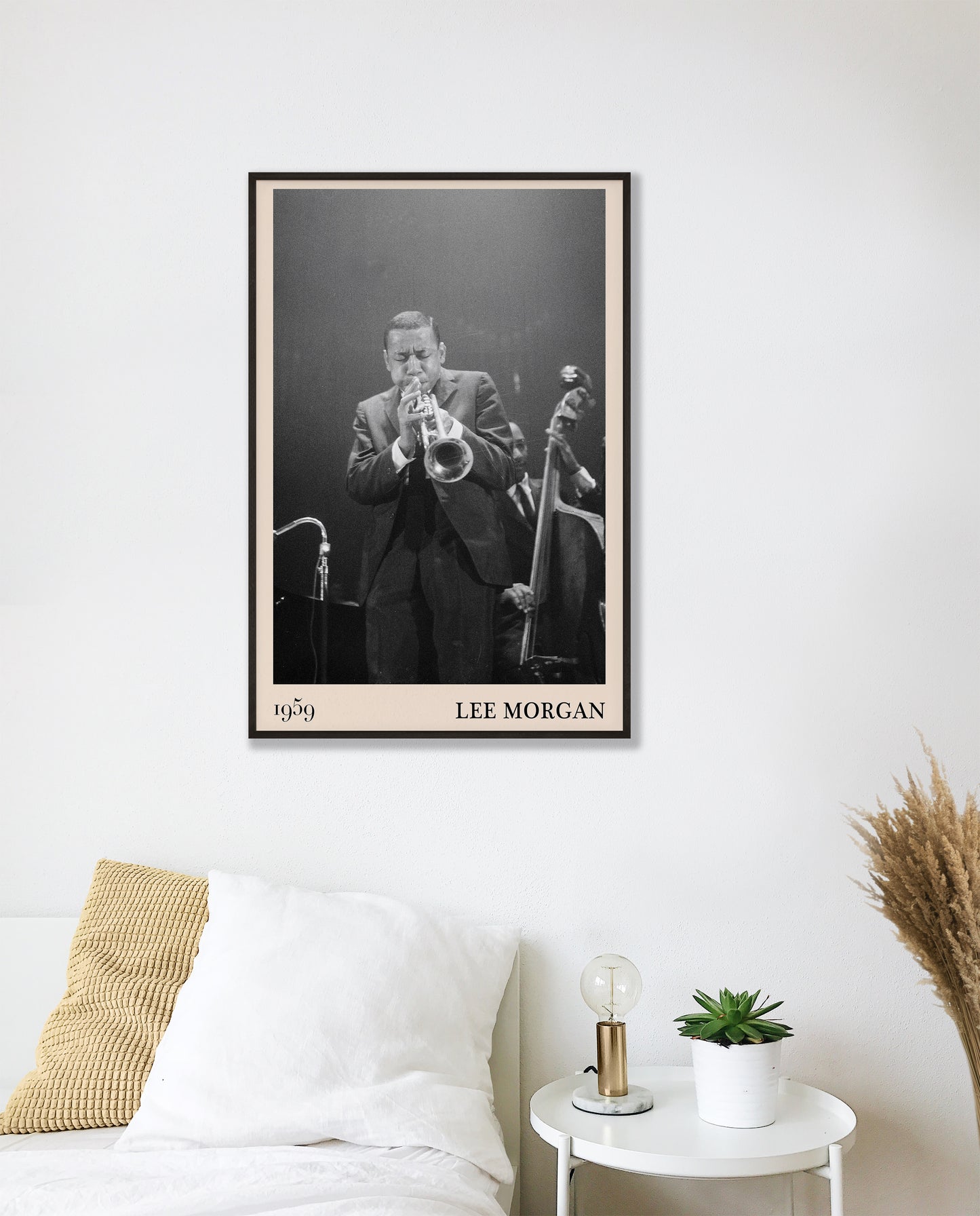 1959 photograph of Lee Morgan playing the Trumpet transformed into a stylish black-framed retro poster hanging on a white bedroom wall