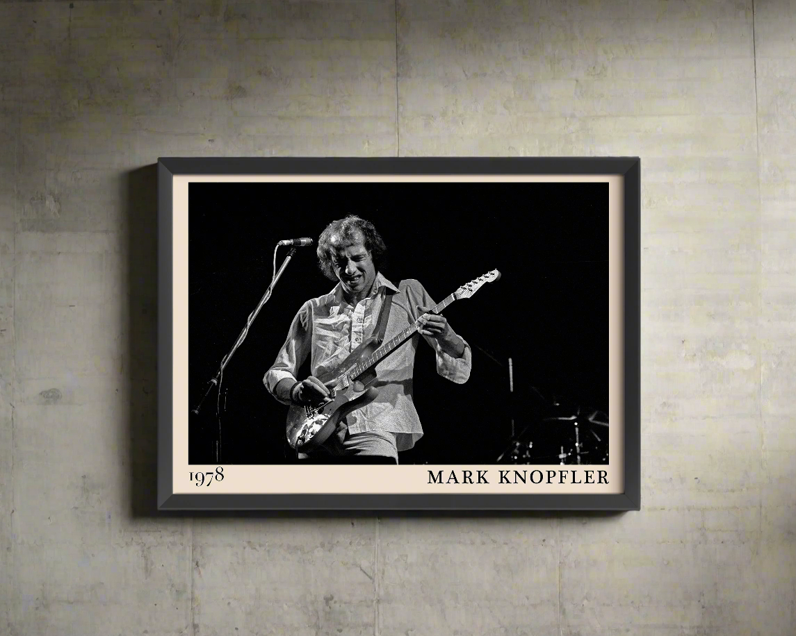 Iconic image of rock legend Mark Knopfler performing, captured by Heinrich Klaffs and transformed into vintage-inspired wall decor hanging on a rustic concrete wall in dappled sunlight