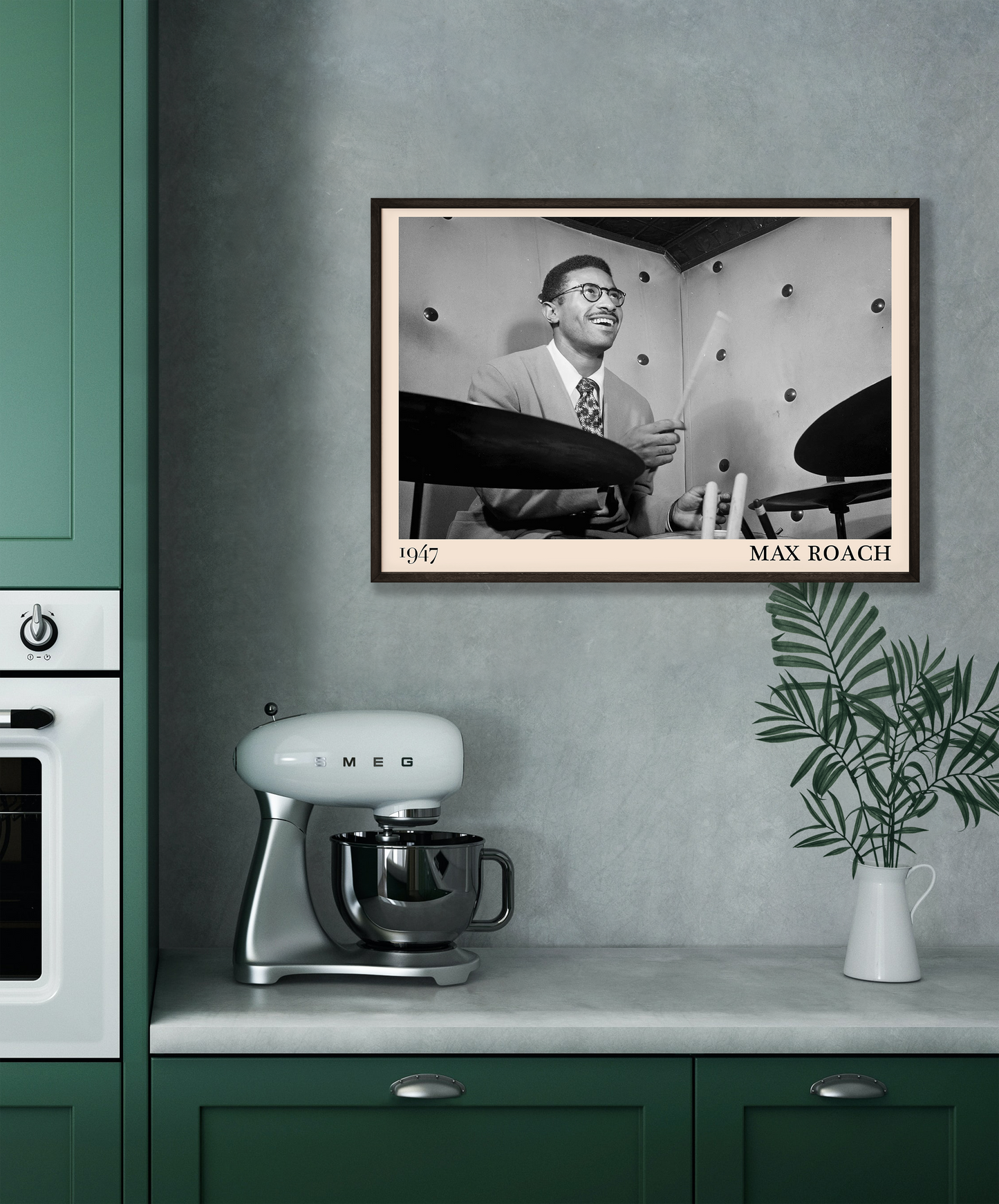 1947 photograph of Sonny Rollins playing the drums, transformed into a retro black-framed jazz poster hanging on a grey kitchen wall
