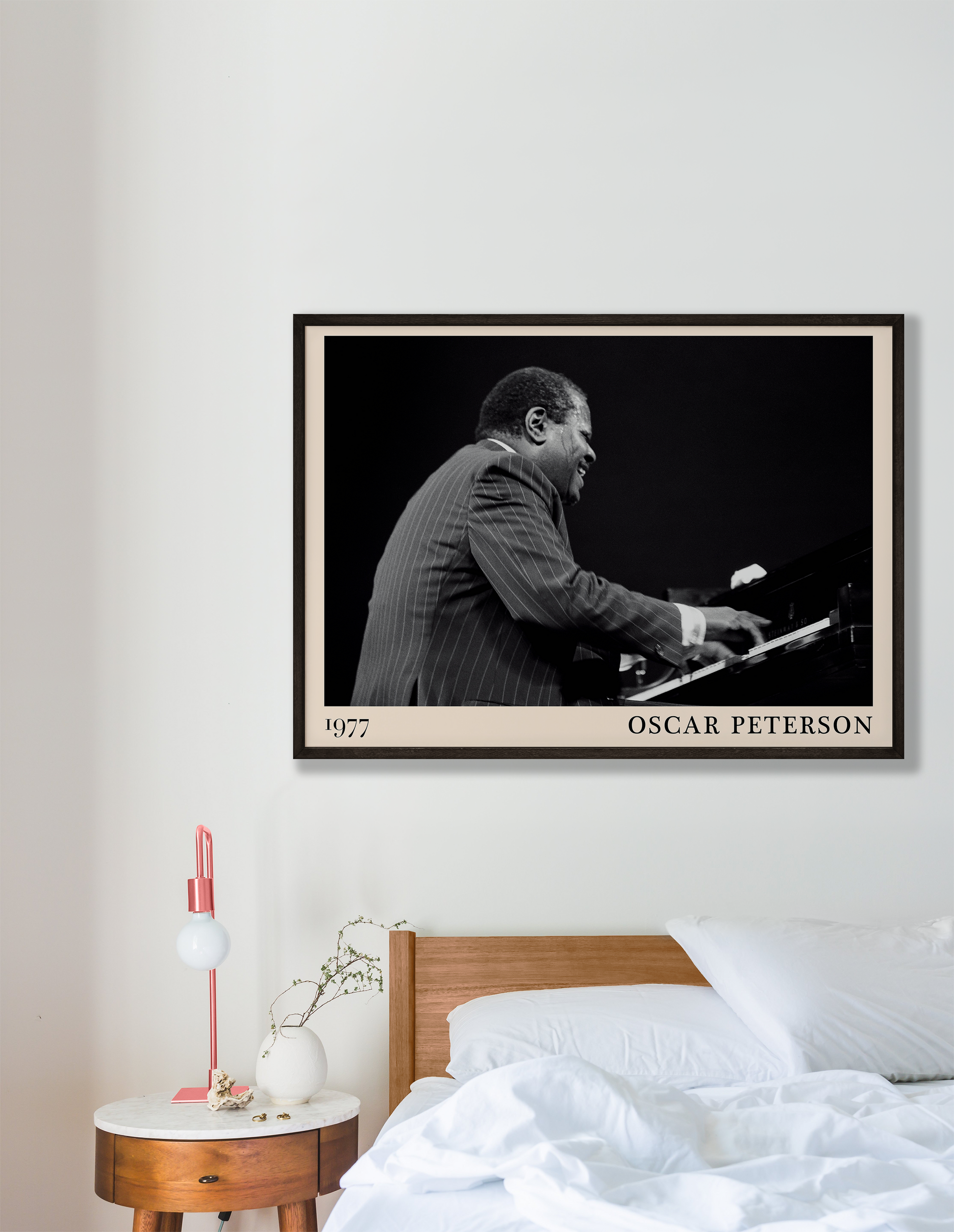 1977 photograph of Oscar Peterson taken by Thomas Marcello. Picture crafted into a cool black framed jazz print, with an off-white border. Poster is hanging on a white bedroom wall