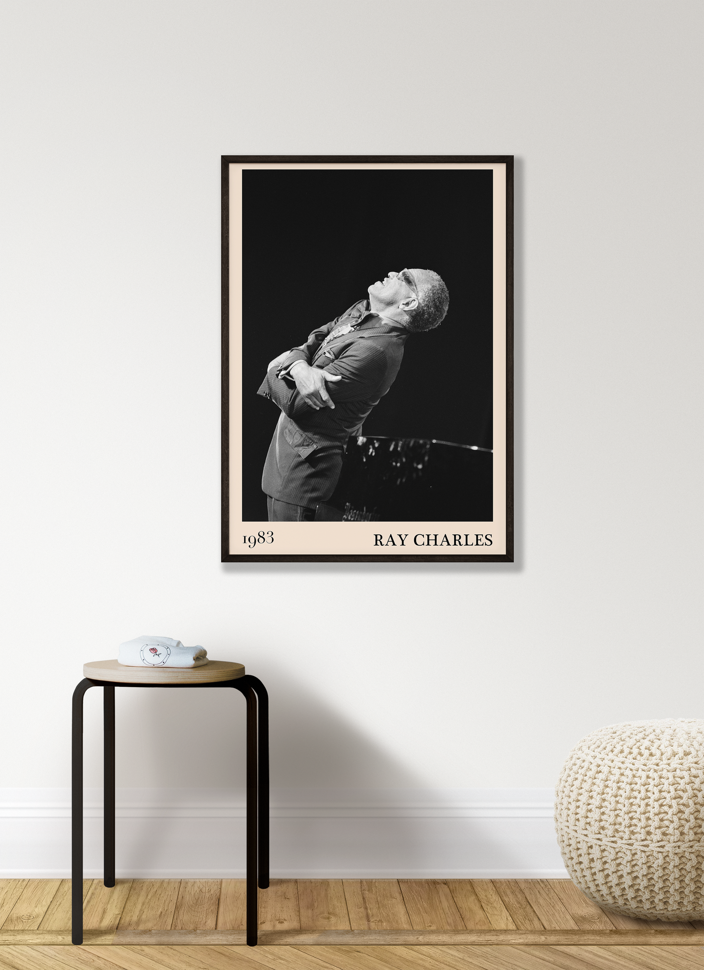 1983 photograph of Ray Charles singing, transformed into a stylish black-framed jazz poster leaning on white living room wall