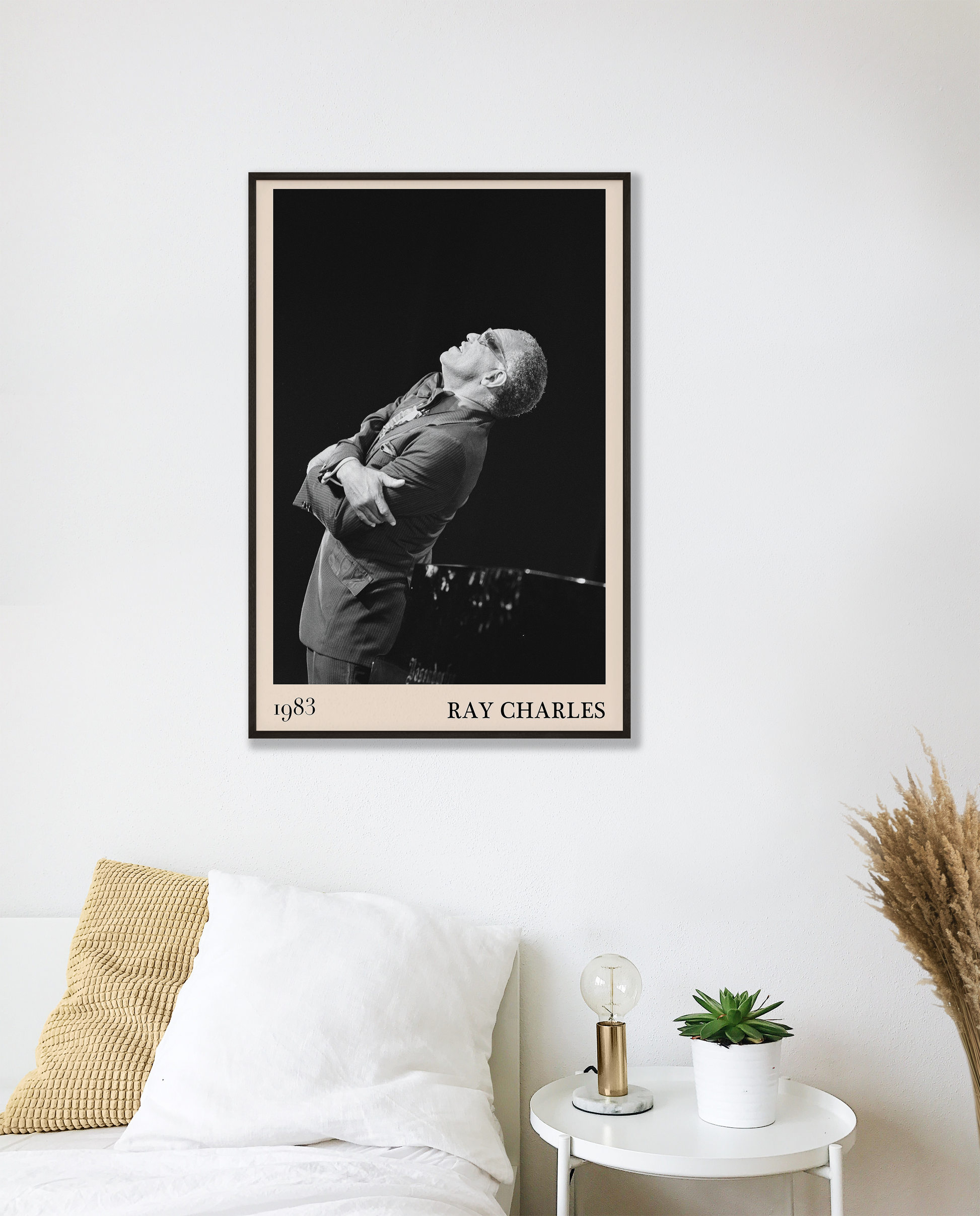 1983 photograph of Ray Charles singing, transformed into a stylish black-framed jazz poster leaning on white bedroom wall