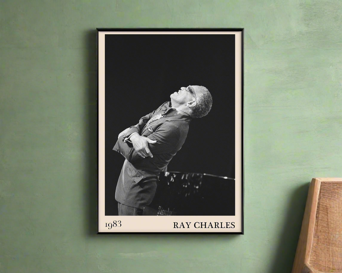 1983 photograph of Ray Charles singing, transformed into a stylish black-framed jazz poster hanging on a green wall