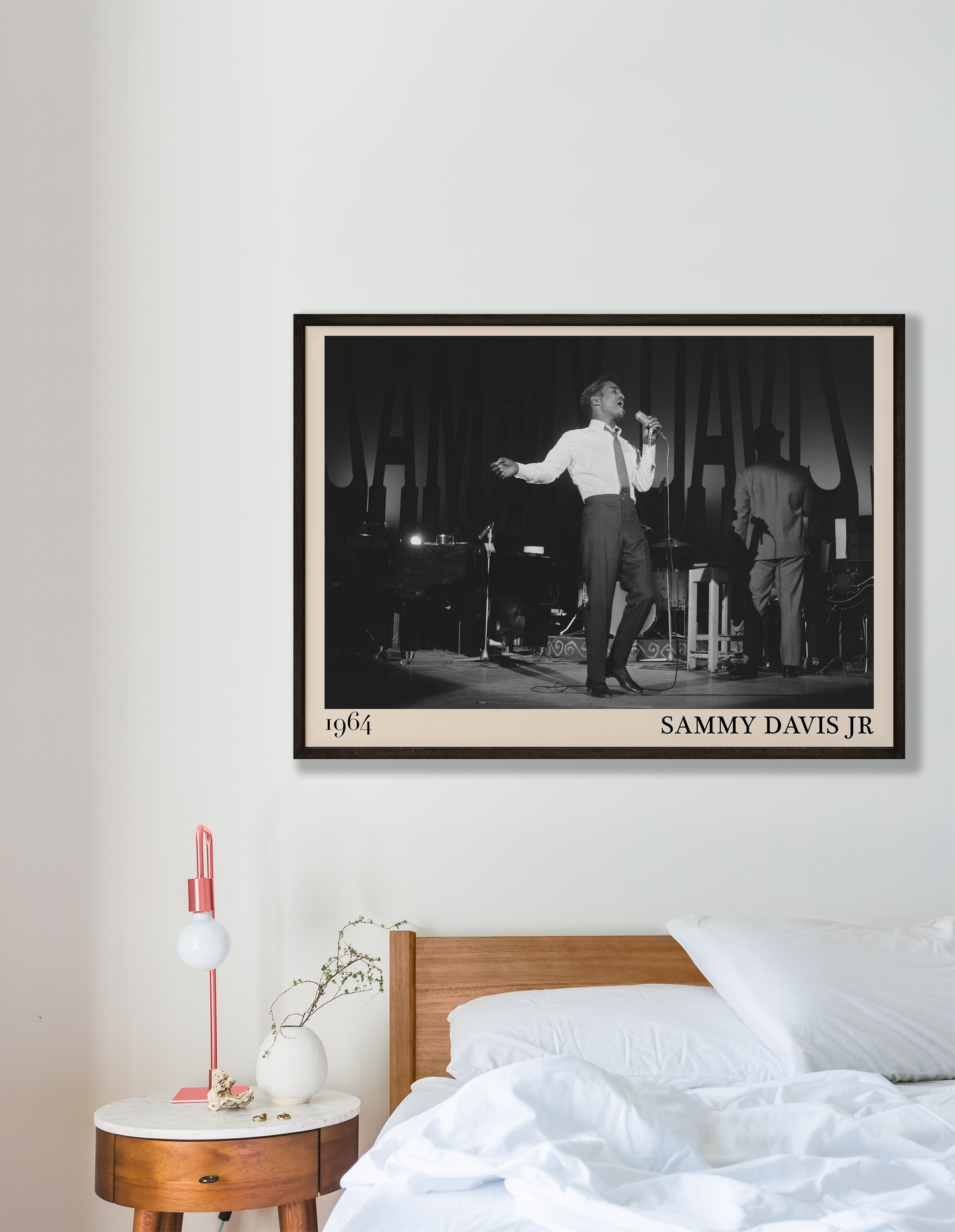 1964 picture of Sammy Davis Jr singing.Picture crafted into a cool black framed jazz print, with an off-white border. Poster is hanging on a grey bedroom wall