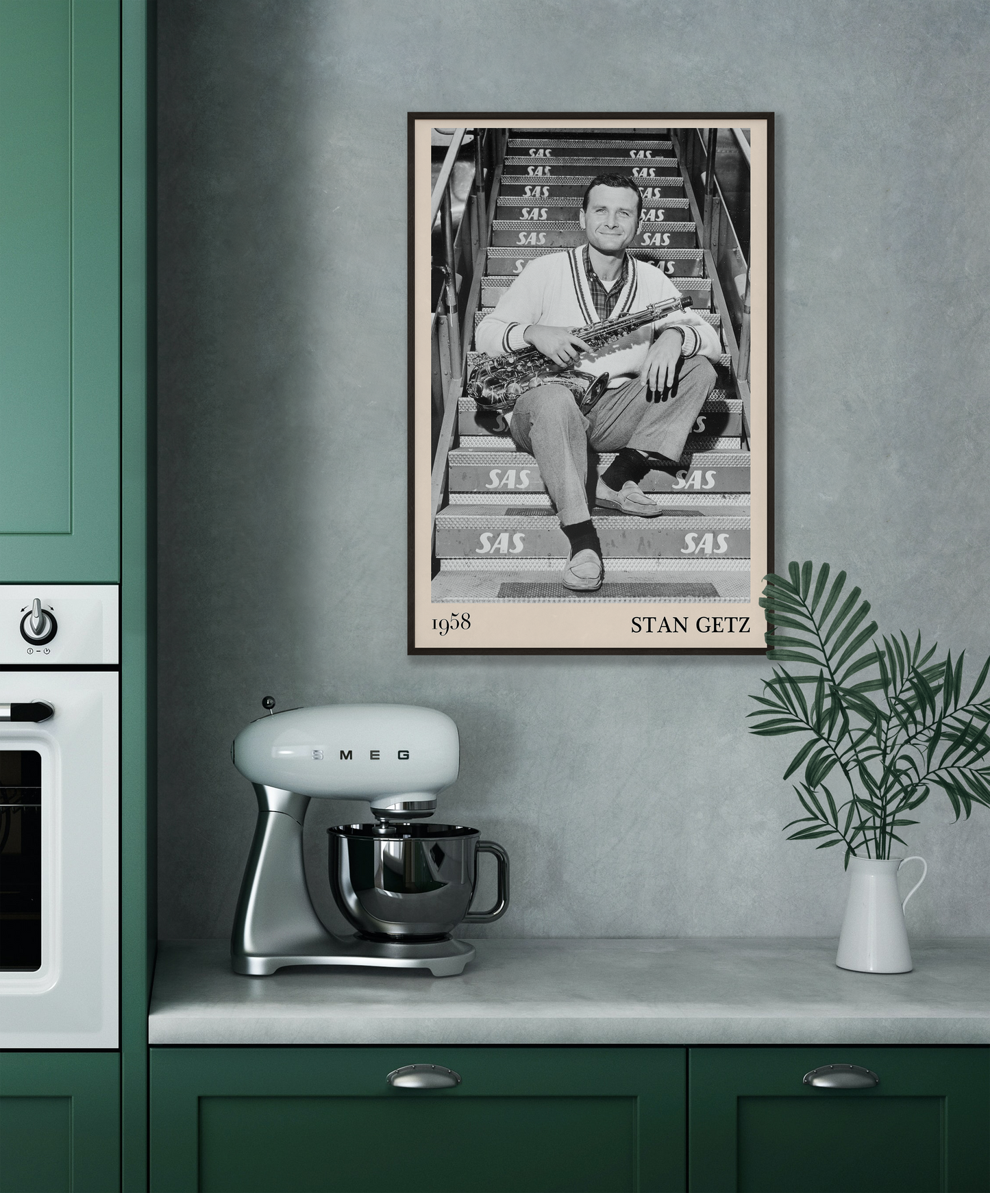 1958 picture of Stan Getz holding his saxophone. Picture crafted into a cool black framed music poster, with an off-white border. Poster is hanging on a grey kitchen wall 