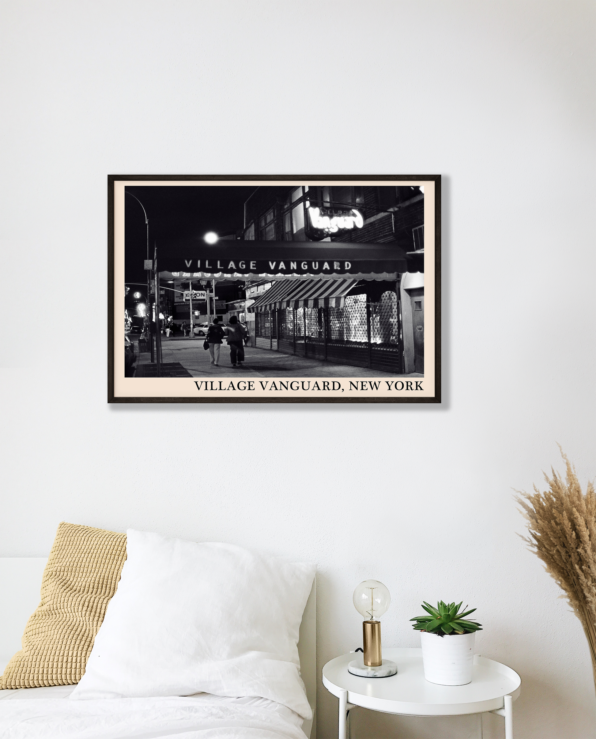 Iconic photo of Village Vanguard in New York taken by Thomas Marcello and captured in a retro black framed jazz print, hanging on a white bedroom wall