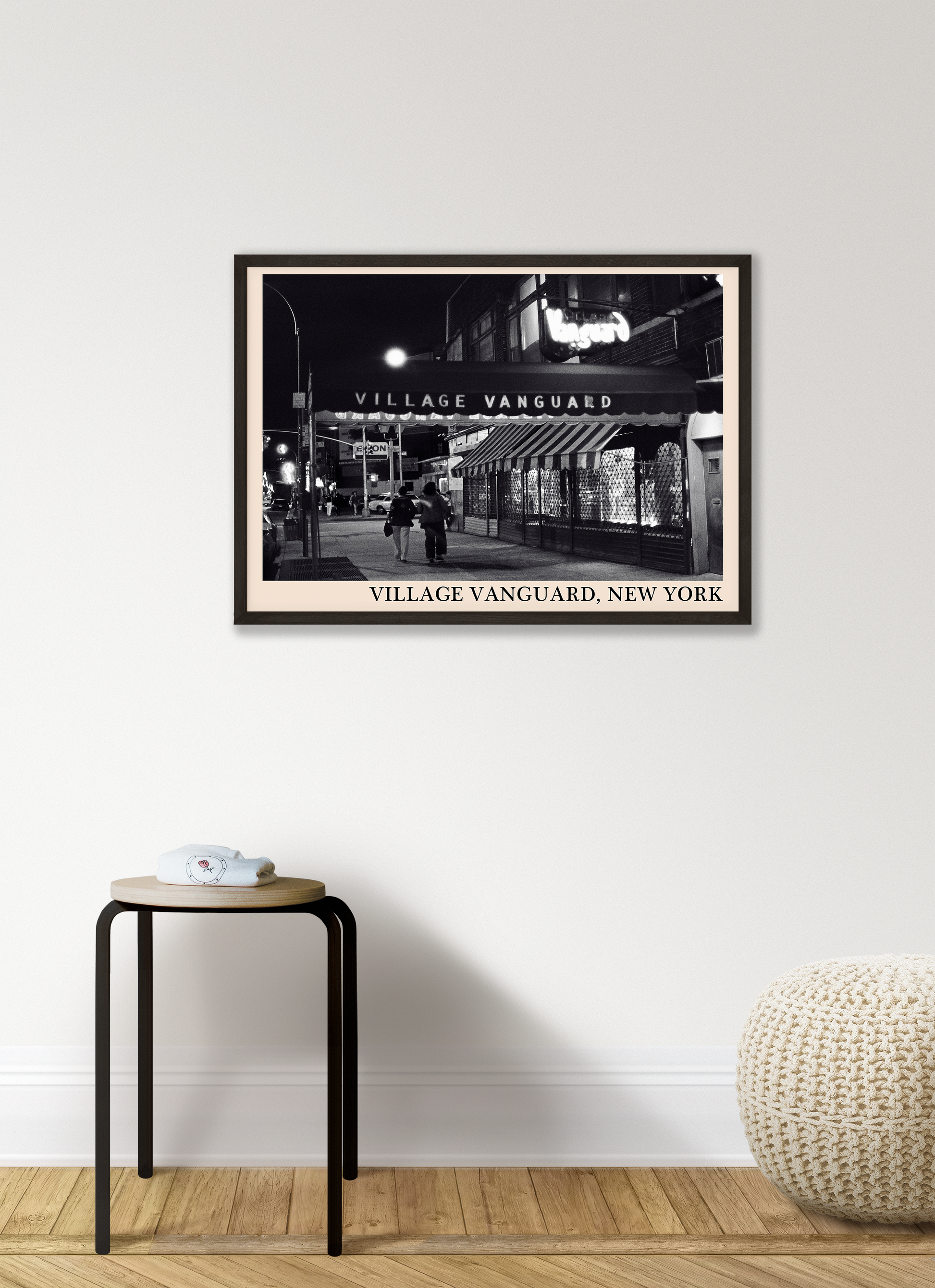 Iconic photo of Village Vanguard in New York taken by Thomas Marcello and captured in a retro black framed jazz print, hanging on a white living room wall