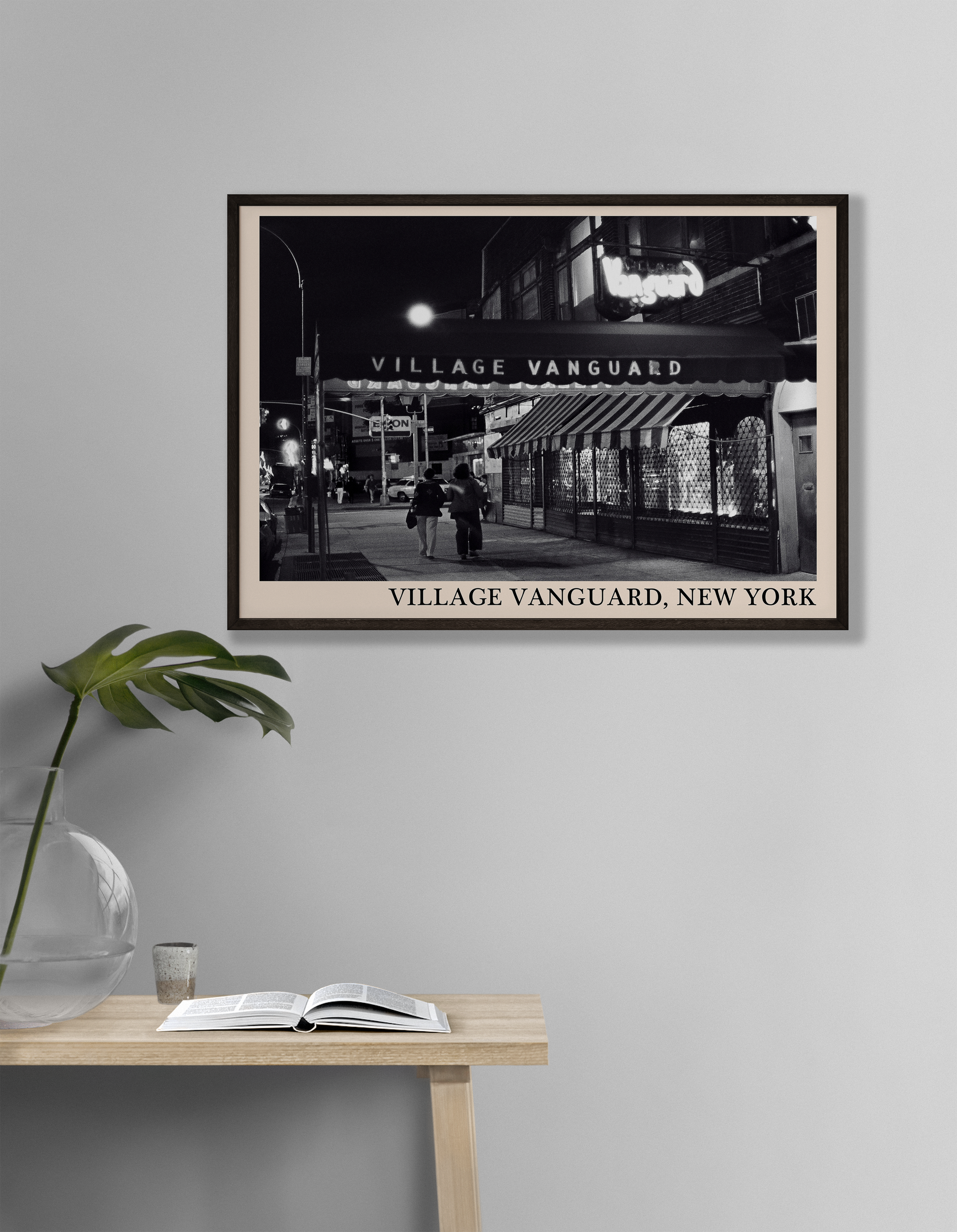 Iconic photo of Village Vanguard in New York taken by Thomas Marcello and captured in a retro black framed jazz print, hanging on an off-white living room wall