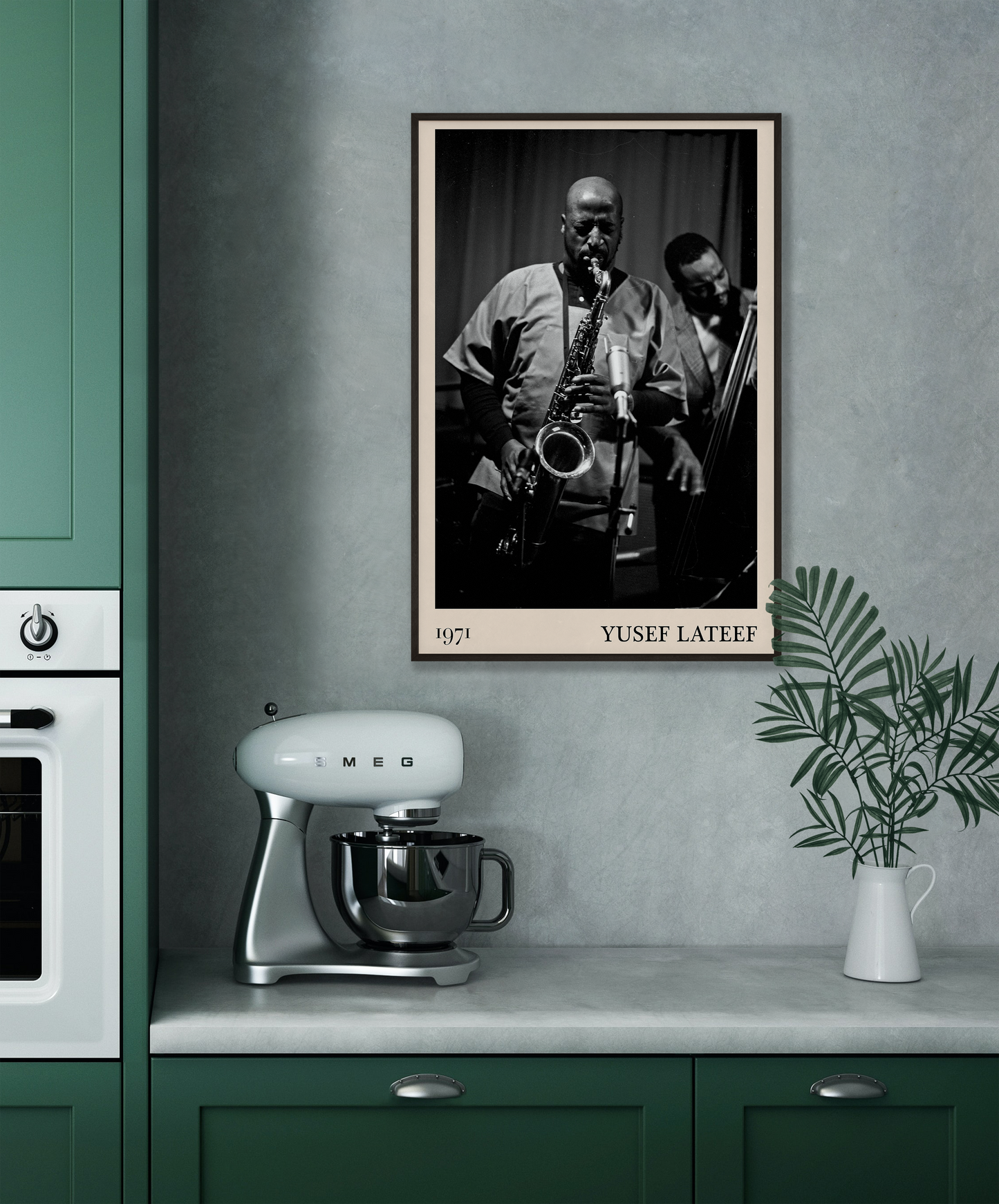 1971 photo of Yusef Lateef crafted into a black framed-poster, hanging on a grey kitchen wall