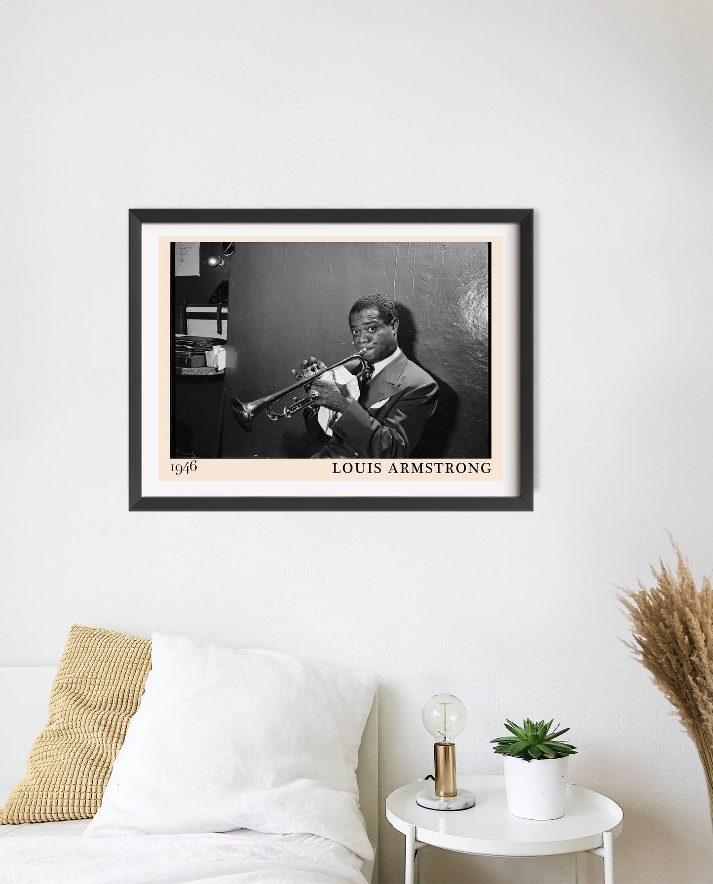 Louis Armstrong vintage jazz poster in landscape 20 mount mockup above a modern white bed, monochrome trumpet portrait design