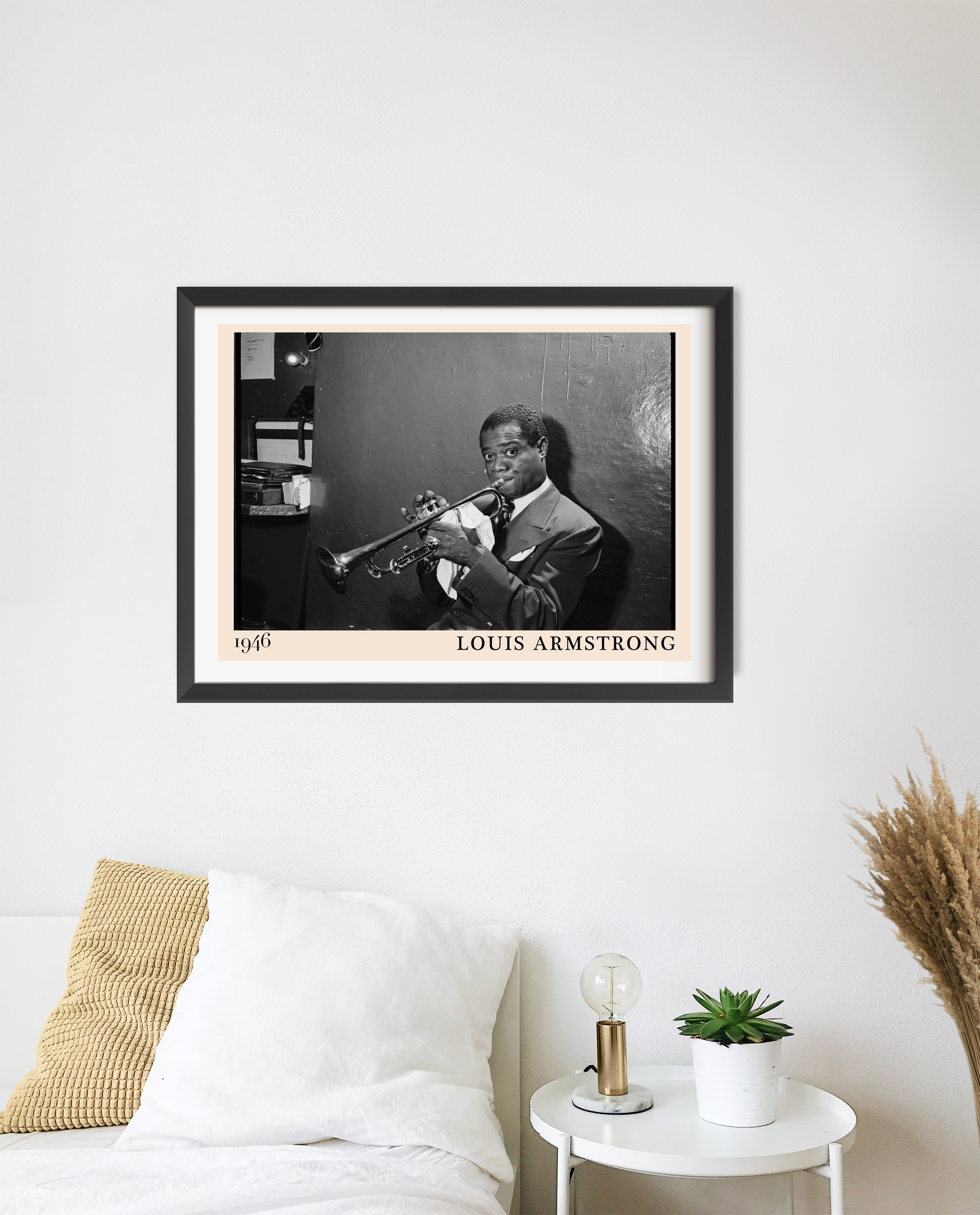 Louis Armstrong vintage jazz poster in landscape 20 mount mockup above a modern white bed, monochrome trumpet portrait design