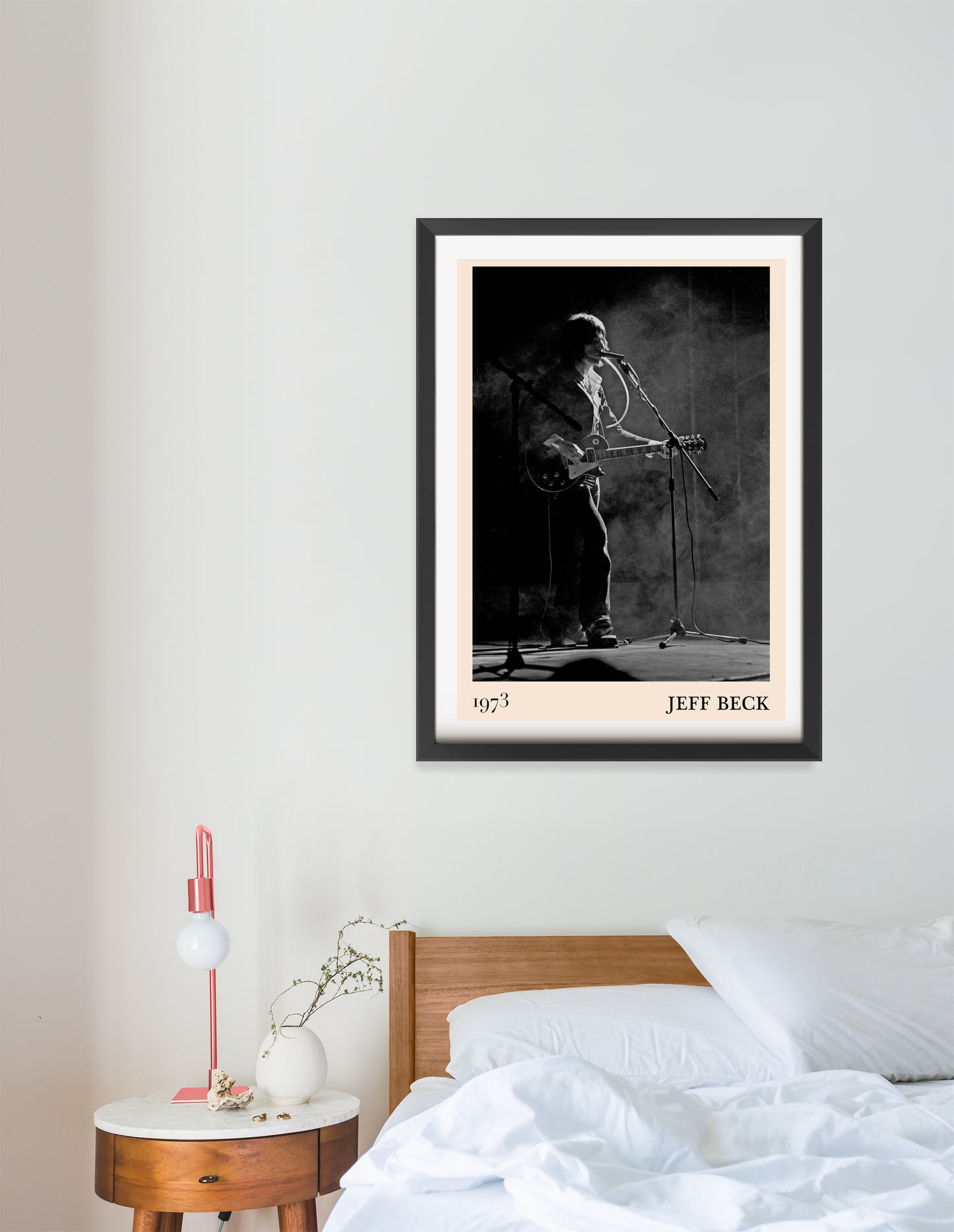 Jeff Beck Rock Concert Poster in portrait 16 mount mockup above modern bed, black and white 1973 guitar stage design.