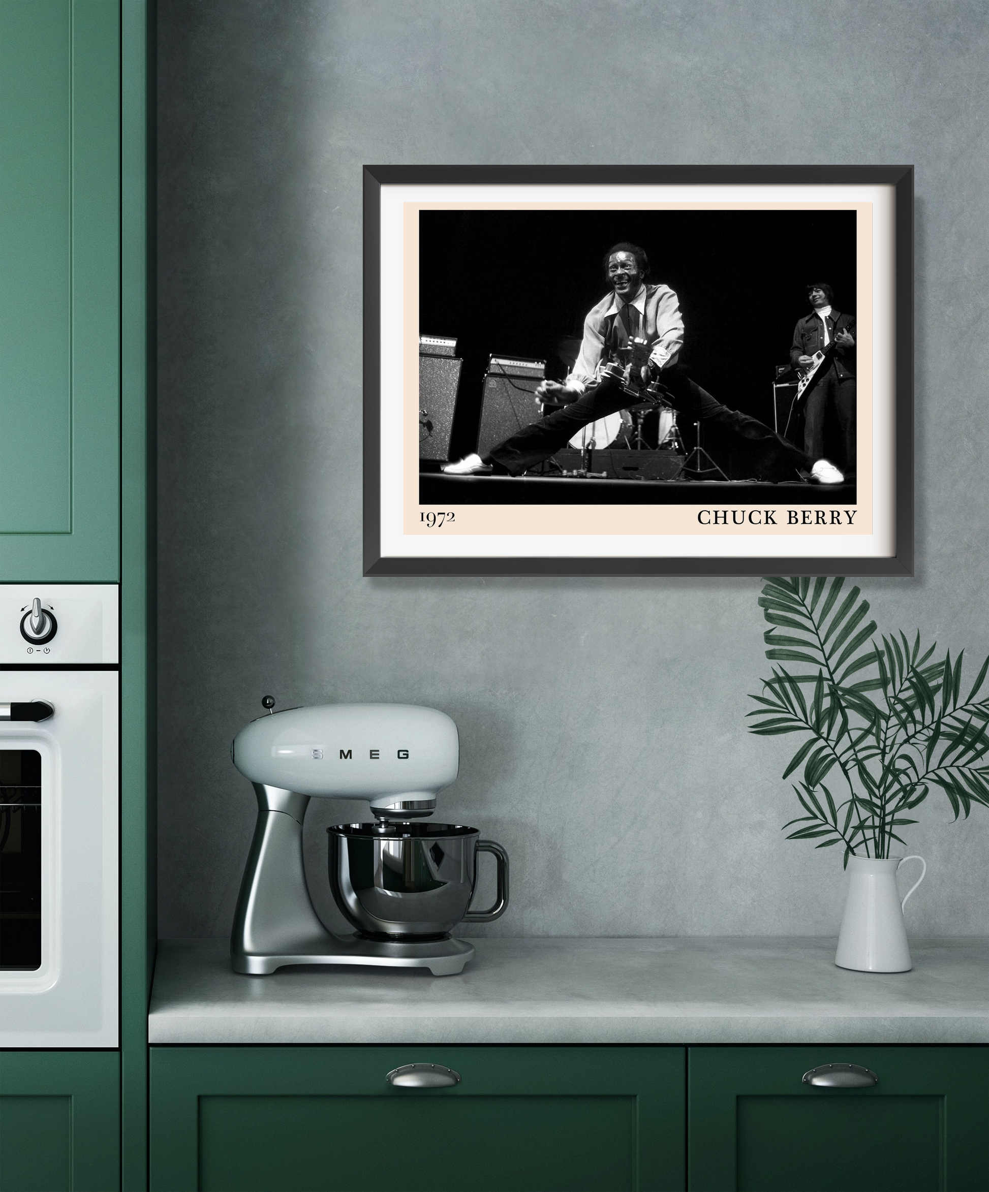 Chuck Berry Retro Rock Poster in landscape mount, black and white stage photo, framed on modern kitchen wall above counter.