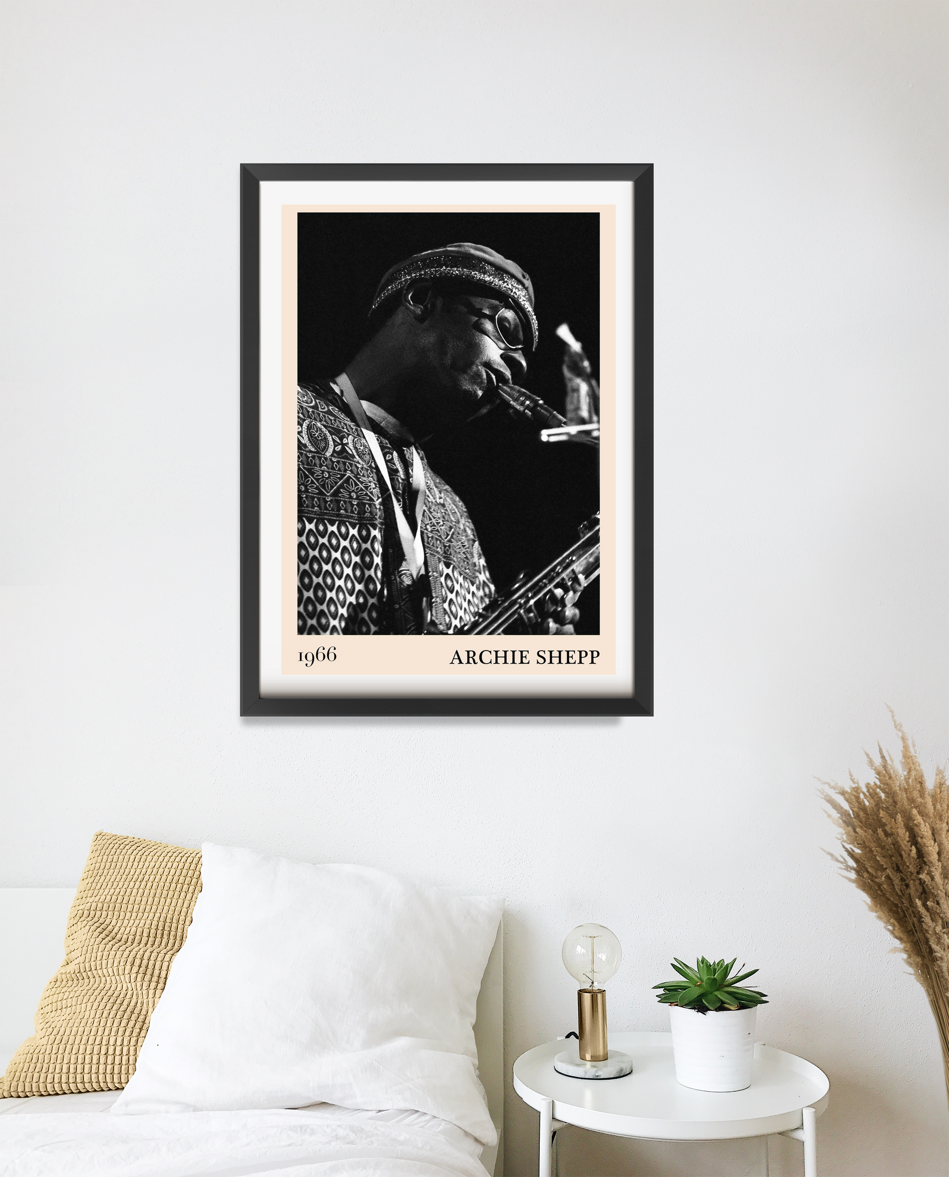 Archie Shepp Jazz Concert Poster in portrait 20 mount mockup, black and white design above modern bed and nightstand decor.