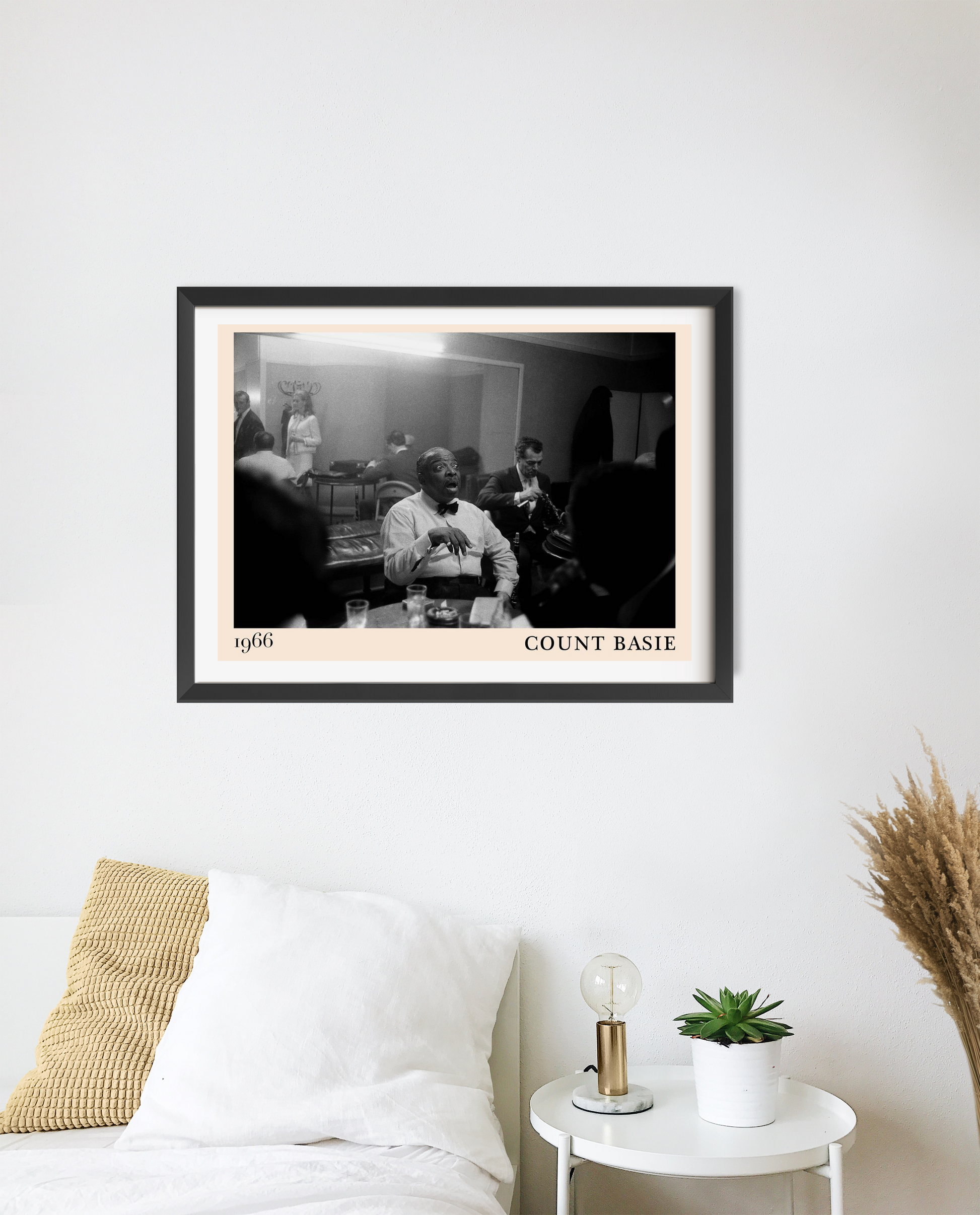 Count Basie Iconic Jazz Poster in landscape mount mockup above a modern bed, featuring a black and white 1966 jazz scene.