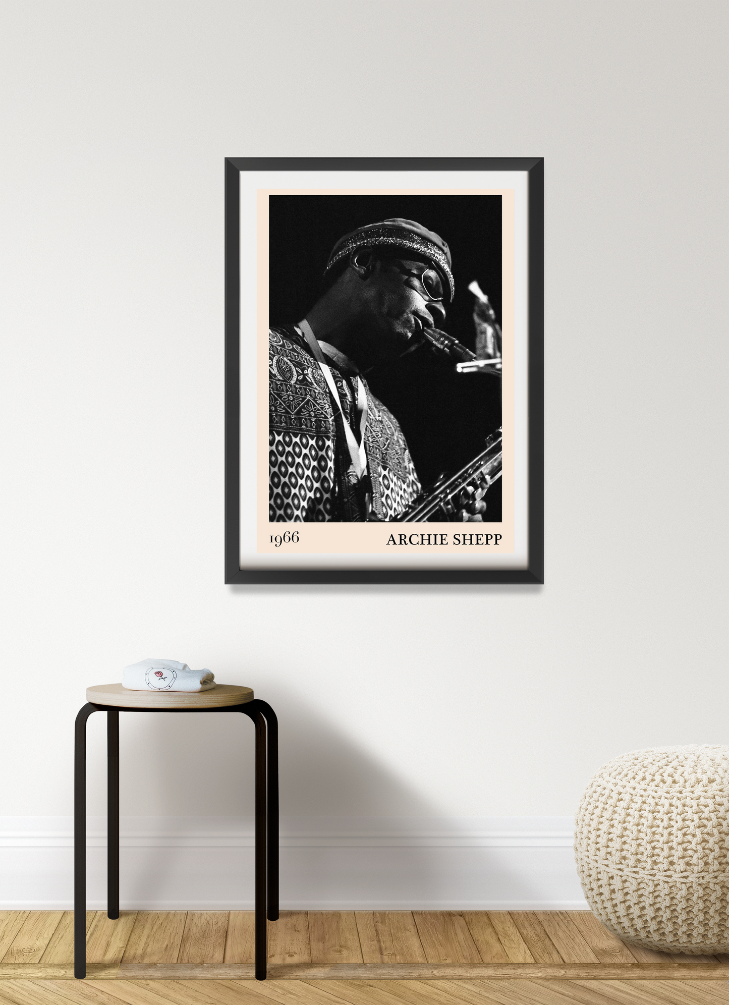 Archie Shepp Jazz Concert Poster in portrait 7 mount mockup, black frame on modern wall, monochrome saxophonist design.
