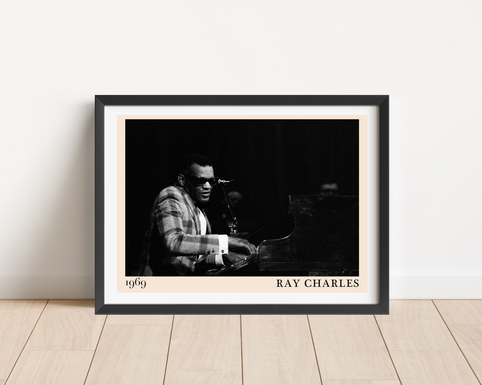 Ray Charles Jazz Concert Poster in landscape frame mockup, black and white design on wooden floor against white wall, 1969 te
