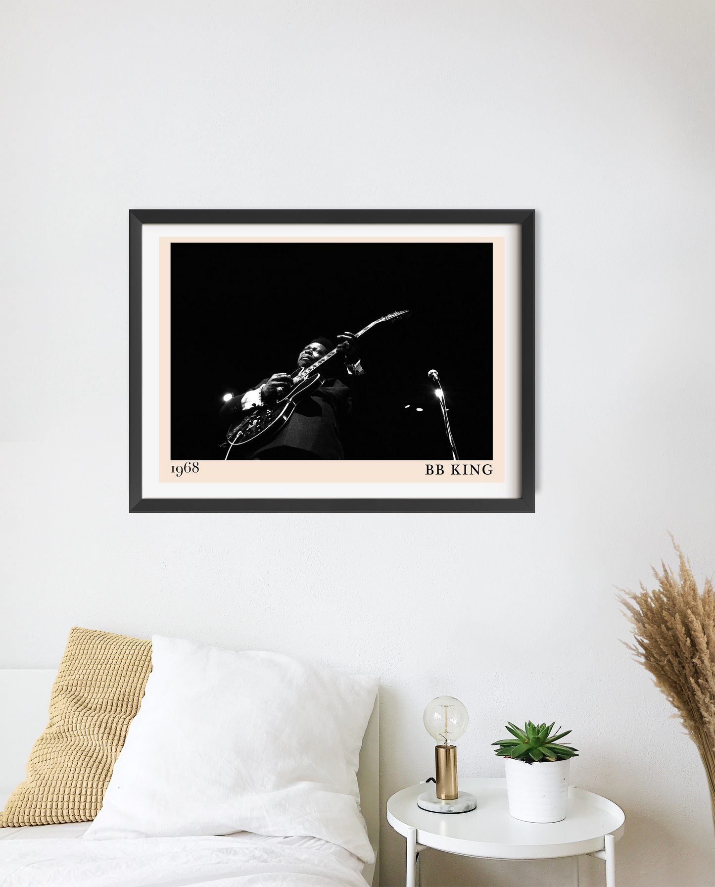 BB King Vintage Blues Poster in landscape mount mockup above bed, black and white concert photo, minimalist bedroom decor