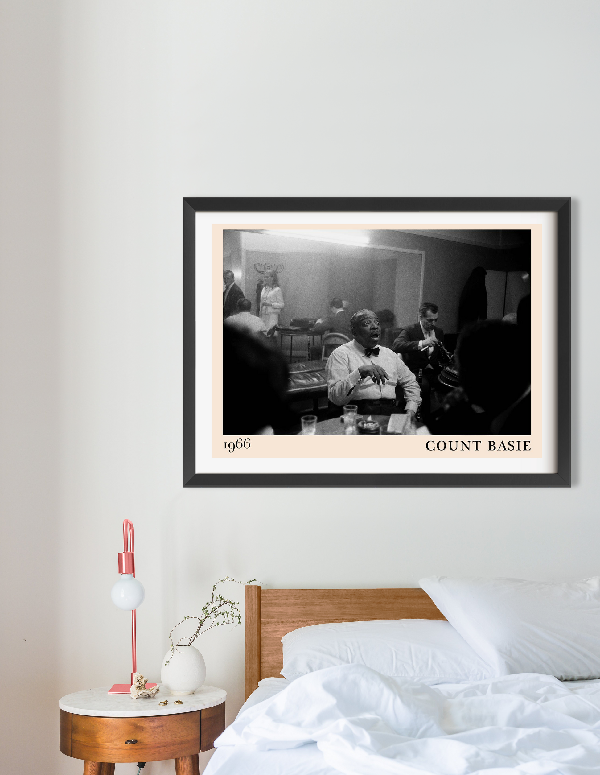 Count Basie Iconic Jazz Poster in landscape 16 mount above a modern wooden bed, black and white jazz club photo, 1966 design.