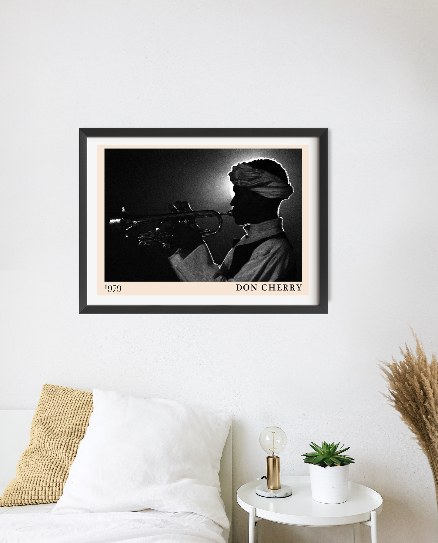 Don Cherry Jazz Poster in landscape 20 mount mockup, black and white trumpet design above modern white bed decor.