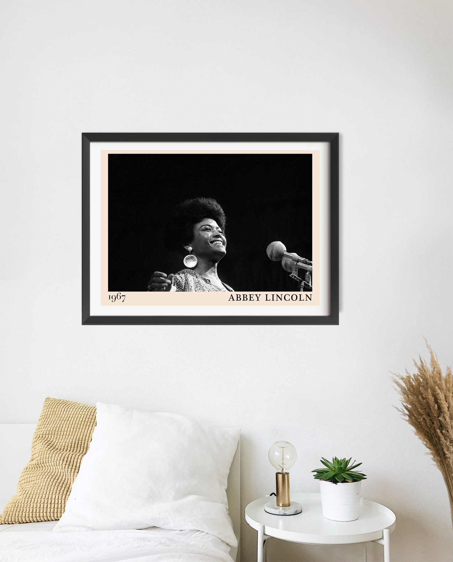 Abbey Lincoln Retro Jazz Poster in landscape 20 mount mockup, black and white design above modern minimalist bed decor.