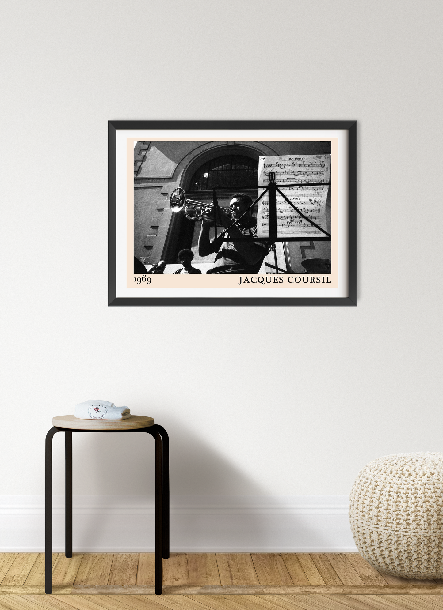 Jacques Coursil Vintage Jazz Poster in landscape mount mockup, black and white trumpet player design above modern stool.