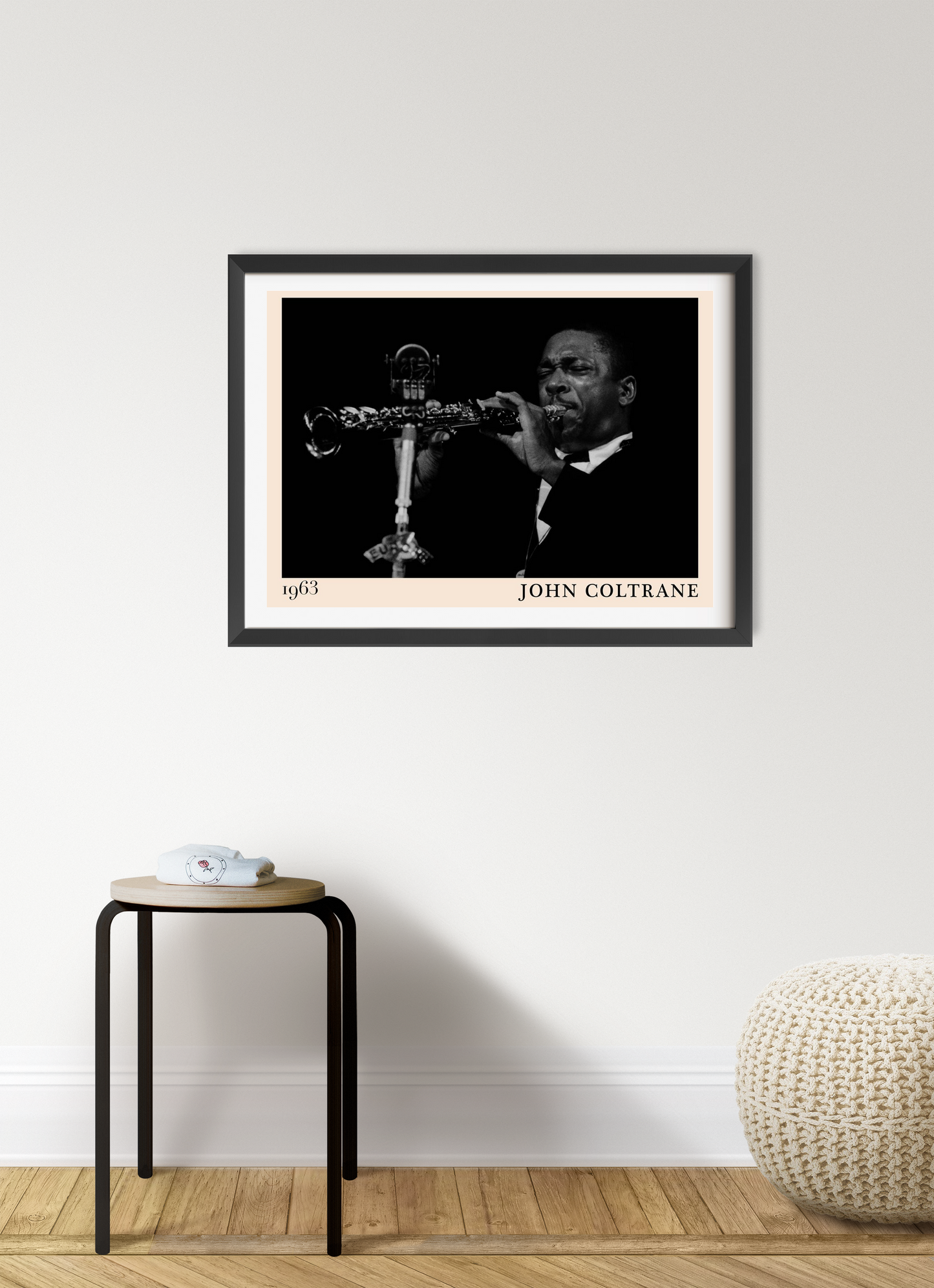 John Coltrane retro jazz poster mockup in stylish landscape mount, black and white photo framed on modern white wall.