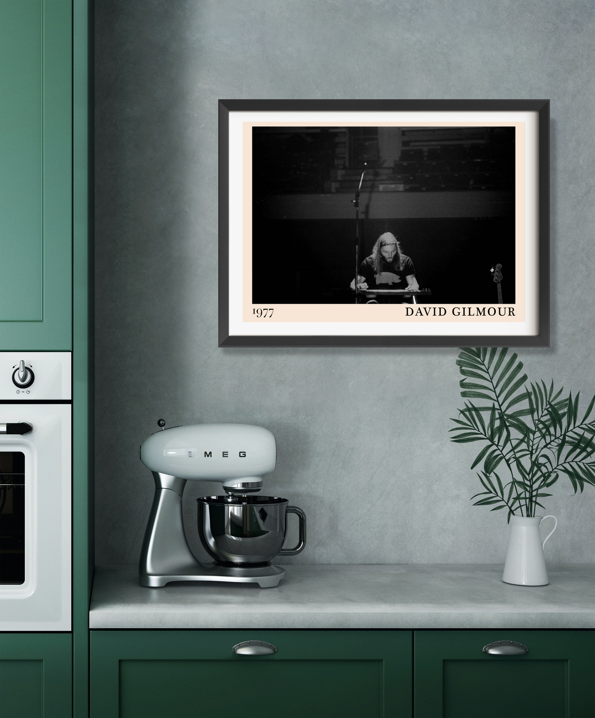 David Gilmour 1977 framed concert print in black and white, hung on a grey kitchen wall above a Smeg stand mixer