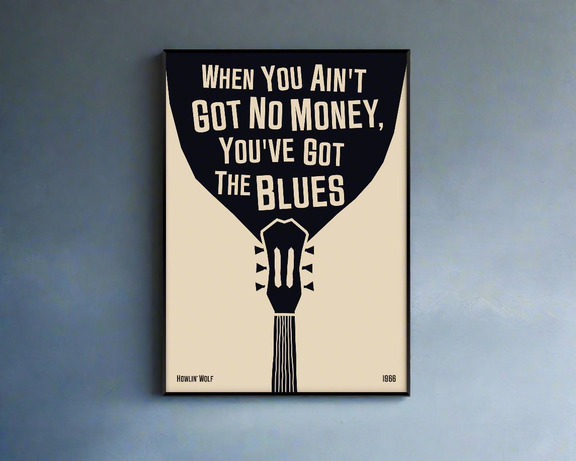 Cool blues music poster with guitar design, featuring a Howlin' Wolf quote. Retro black frame print, leaning against a white wall, perfect home decor.